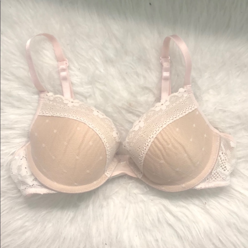 White laced nude colored push-up bra